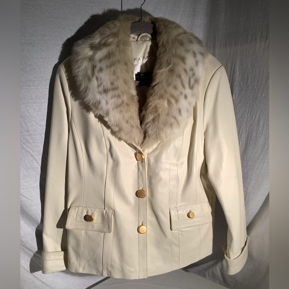 Terry Lewis white leather jacket with detachable collar.